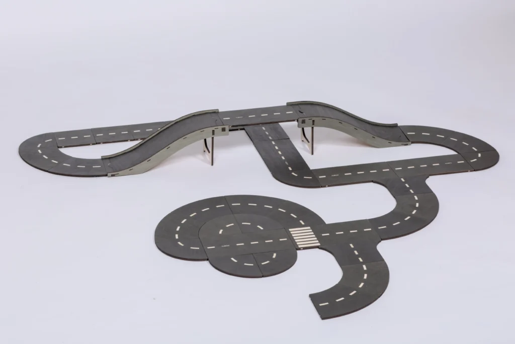 Wooden toy track for model cars with bridge